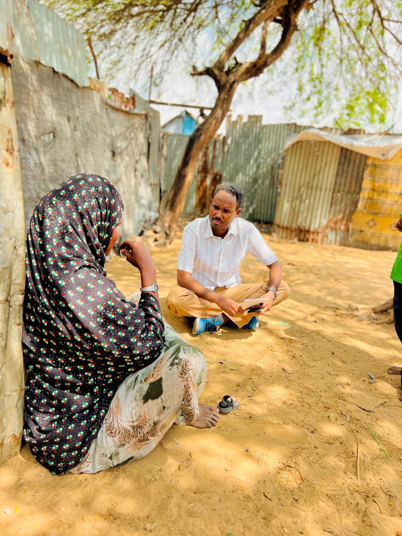 EDEP enumerator conducting a household interview in a displacement settlement